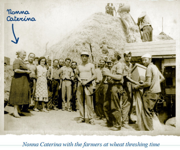 Nonna Caterina with the farmers at wheat threshing time
