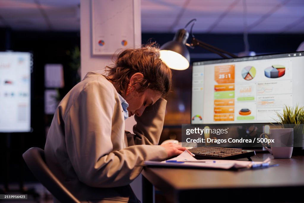 Businesswoman working late in office